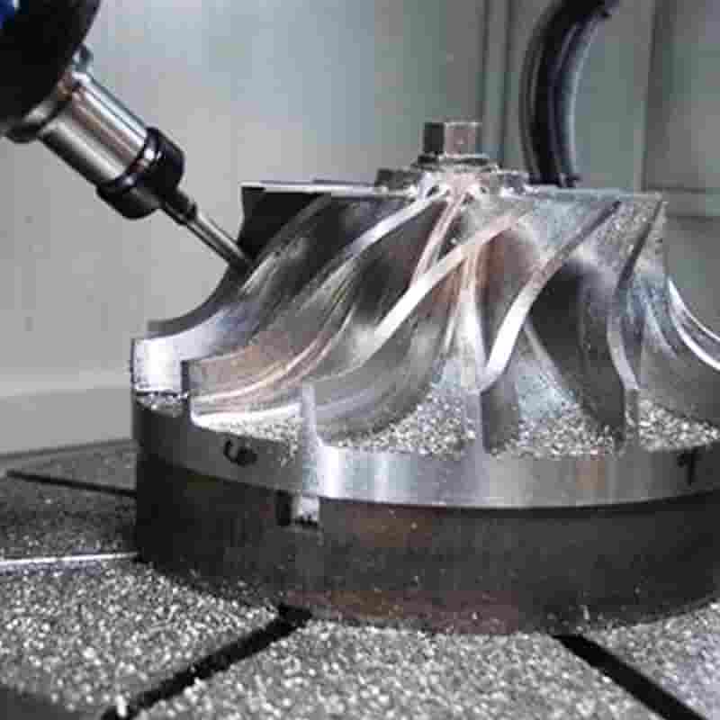 5-axis CNC milling center machining a complex metal part