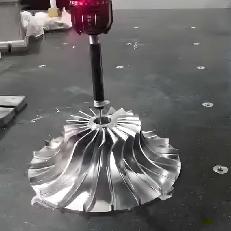 Coordinate measuring machine inspecting an impeller